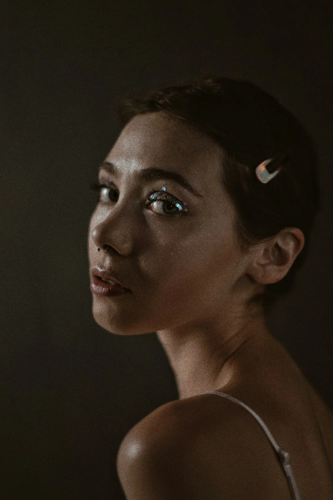 Portrait preparation — considered, calm, editorial composition